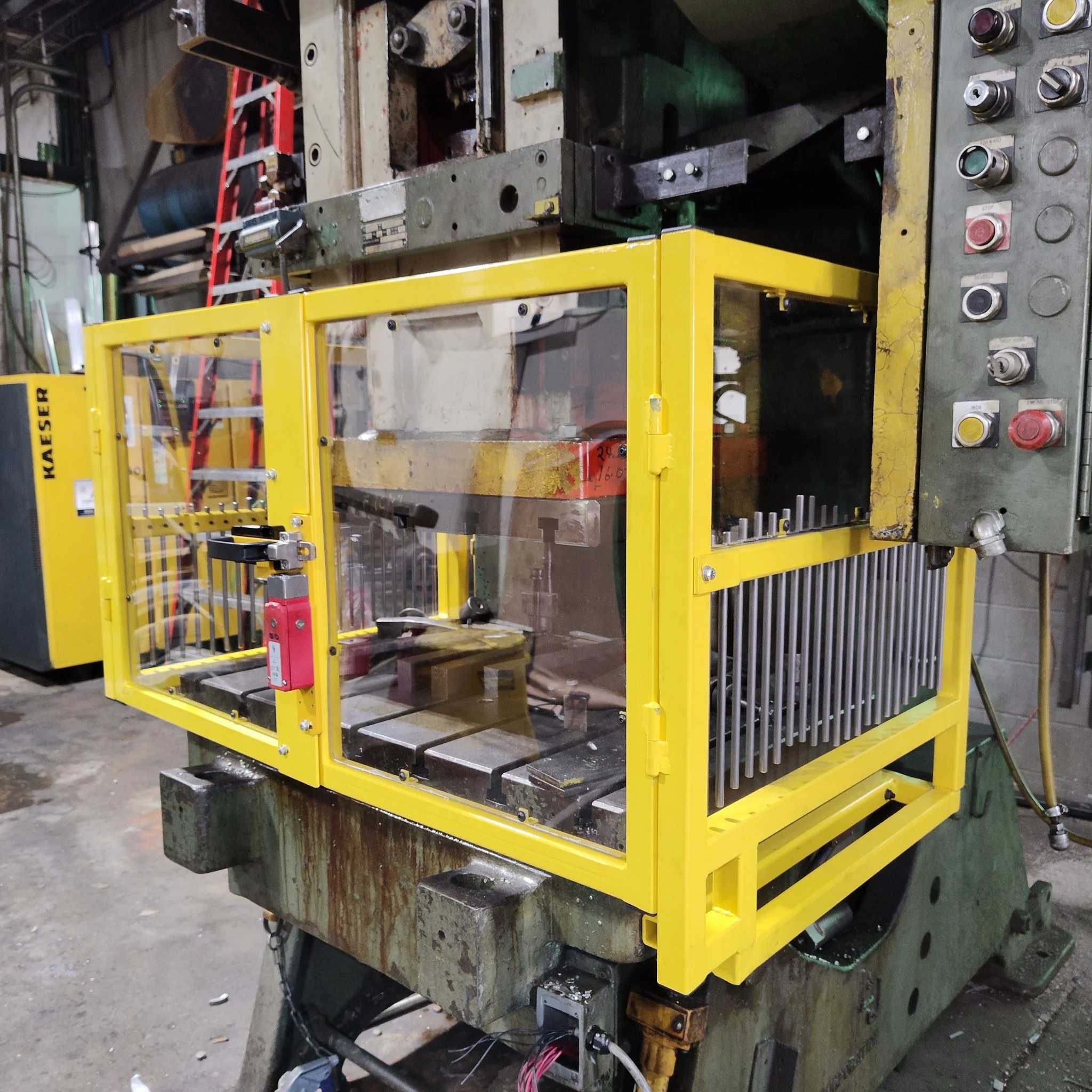 Stamping press guard with interlocked doors and vertical adjustable rods
